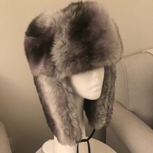 Winter faux fur snow trapper hat with faux fur poms